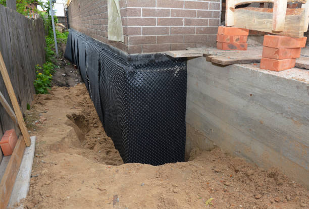 Happy homeowners after waterproofing job in Wellington